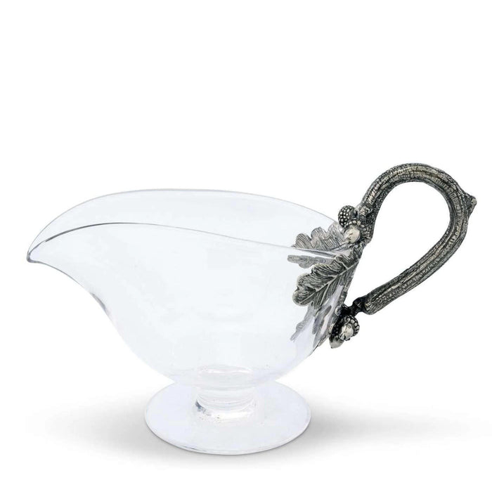 Arthur Court glass gravy boat with a decorative silver-tone metal handle featuring an acorn and oak leaf motif.