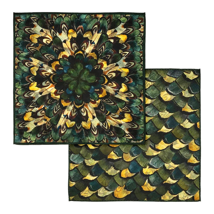 Brackish Mast silk pocket square featuring layered, multicolored feathers in moss green, navy, and rust in a floral pattern.