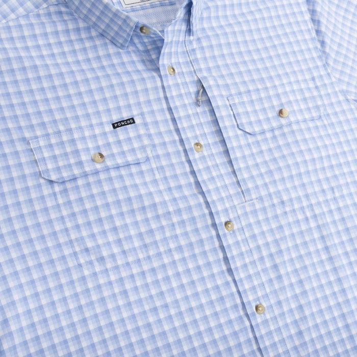 Light blue and white gingham performance shirt with two chest pockets, button-down collar, and Poncho brand logo.