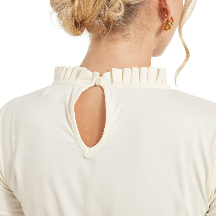 Cream Schoffel Ilkley top featuring a high frill collar and a button-fastening keyhole cutout at the back neck.