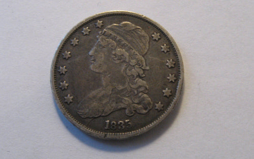 1835 Capped Bust Quarter. VF-30 | Of Coins & Crystals