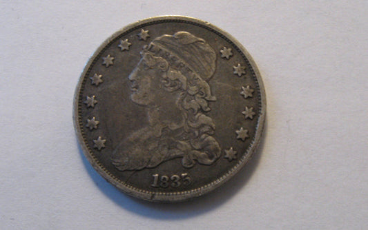1835 Capped Bust Quarter. VF-30 | Of Coins & Crystals
