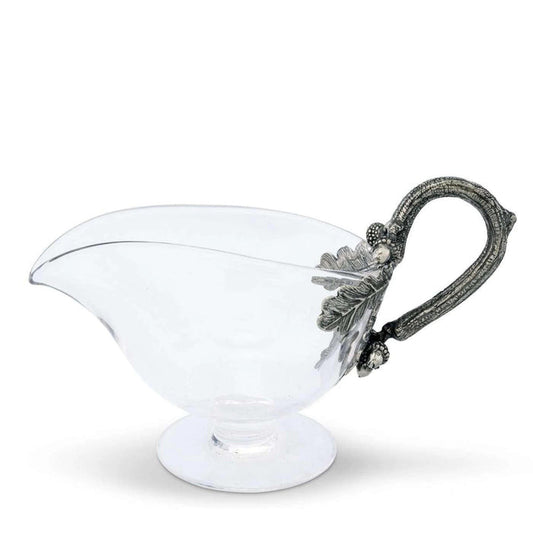 Arthur Court glass gravy boat with a decorative silver-tone metal handle featuring an acorn and oak leaf motif.