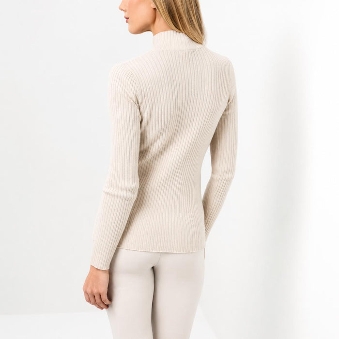 Back view of a slim-fit, beige ribbed knit turtleneck sweater with long sleeves on a model.