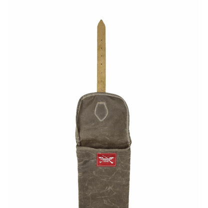 Brown waxed canvas shotgun scabbard with leather strap and Armageddon Gear red logo patch.