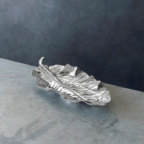 Large silver aluminum alloy serving platter shaped like a graceful zebra leaf with a polished, reflective finish.