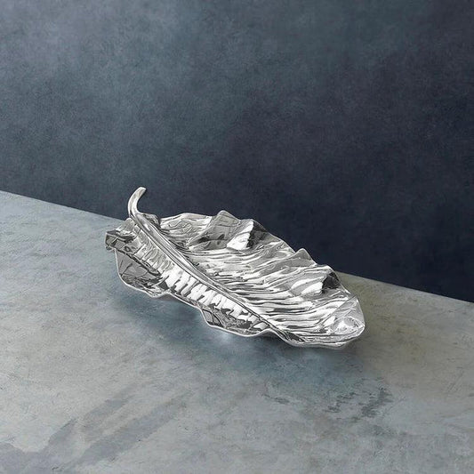 Large silver aluminum alloy serving platter shaped like a graceful zebra leaf with a polished, reflective finish.