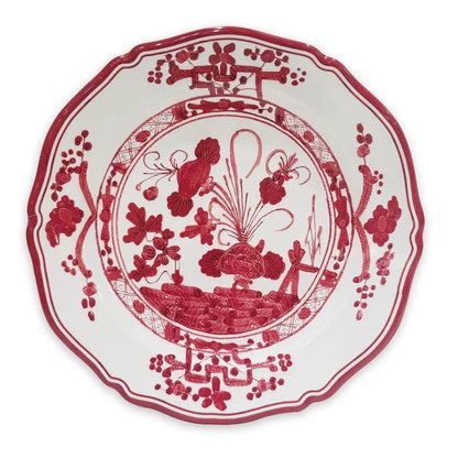 Beatriz Ball 11-inch melamine dinner plate with a white base and intricate red floral and geometric border design.