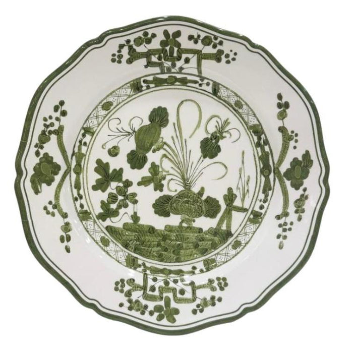 Beatriz Ball 11-inch melamine dinner plate with a scalloped edge and intricate green botanical pattern on white.
