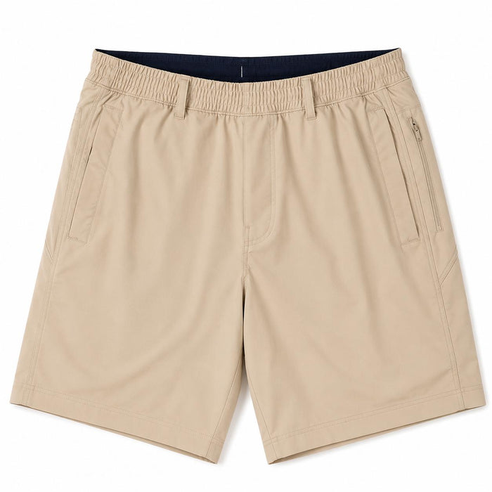 Beige Birddogs 6-inch twill shorts with an elastic waistband, side pockets, and a secure zippered hip pocket.