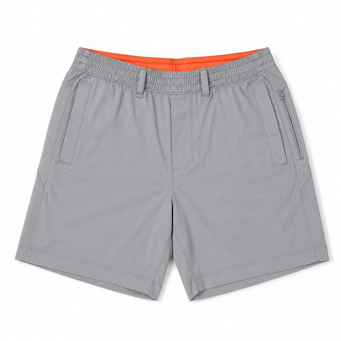 Grey Birddogs 6-inch shorts featuring an elastic waistband, side pockets, and a bright orange interior lining.