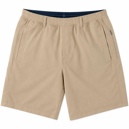 Tan Birddogs 7-inch stretch twill shorts with an elastic waistband, side pockets, and a zippered hip pocket.