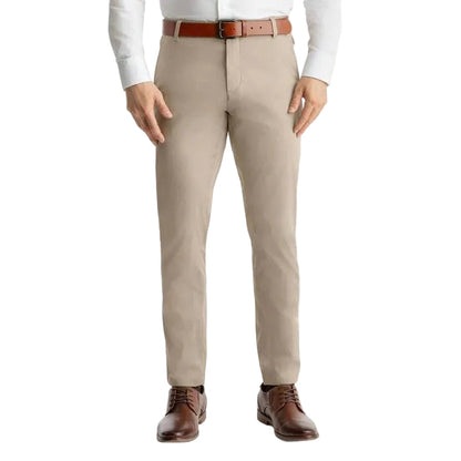 Slim-fit khaki stretch pants in a lightweight cotton blend, worn with a brown leather belt and dress shoes.