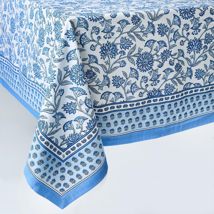 Blue and white cotton tablecloth featuring a classic Chinoiserie floral block print with a decorative border.