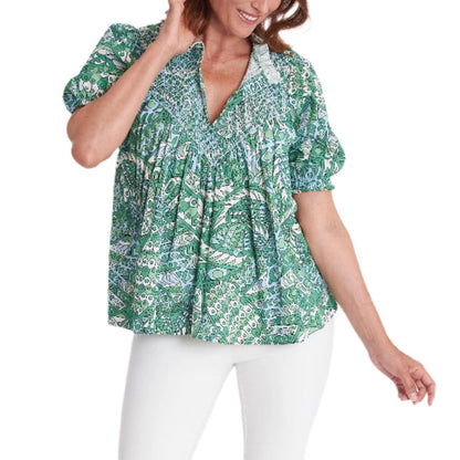 CK Bradley Cayman top in green patterned cotton with smocked detailing, puff sleeves, and a V-neckline.