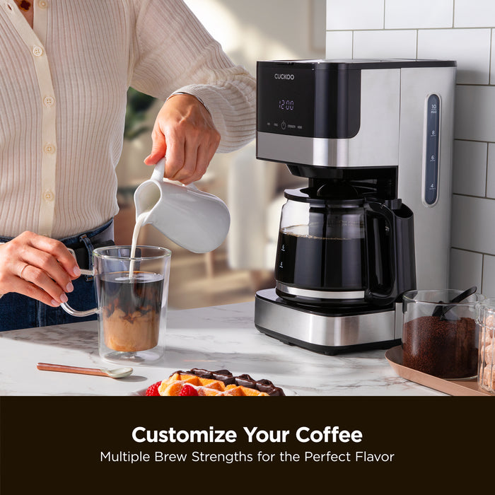 Customize Your Coffee: Multiple Brew Strengths for the Perfect Flavor. A Cuckoo Classic Drip Coffee Maker with coffee. (CCM-BD011B)