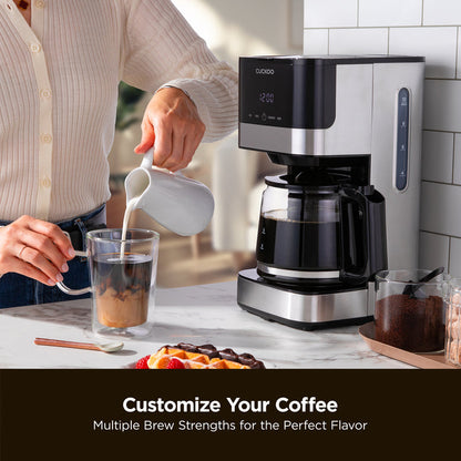 Customize Your Coffee: Multiple Brew Strengths for the Perfect Flavor. A Cuckoo Classic Drip Coffee Maker with coffee. (CCM-BD011B)