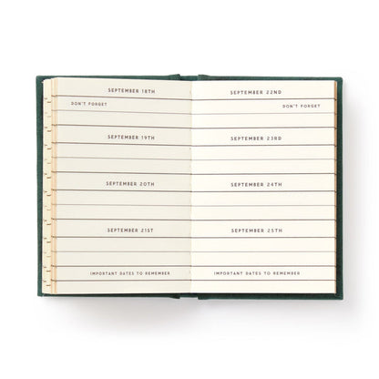 An open hard-bound Dates People Get Mad If I Forget Tiny Diary by Brass Monkey shows a week from September 18th to 25th, each date on its own line with reminders like DONT FORGET and IMPORTANT DATES TO REMEMBER beneath the dates.