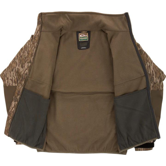 Interior view of Drake Waterfowl MST Eqwader jacket featuring brown fleece lining and camouflage sleeves.