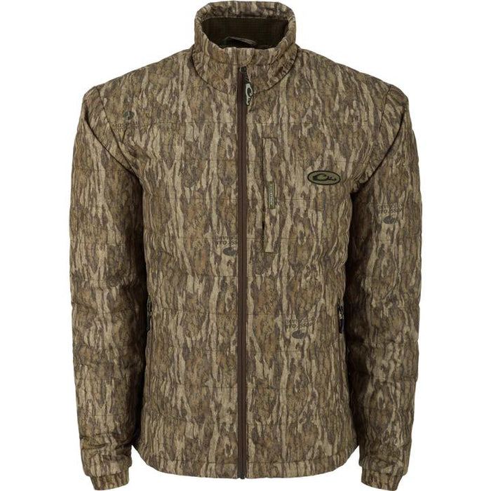 Drake Waterfowl MST synthetic down pack jacket in camouflage print with horizontal baffles and a zippered chest pocket.