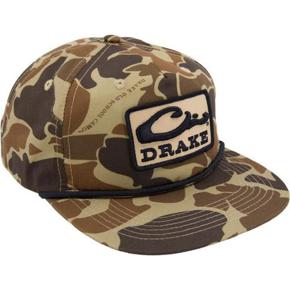 Drake X LOST camo cap with a black paracord rope detail and a rectangular Drake logo patch on the front.