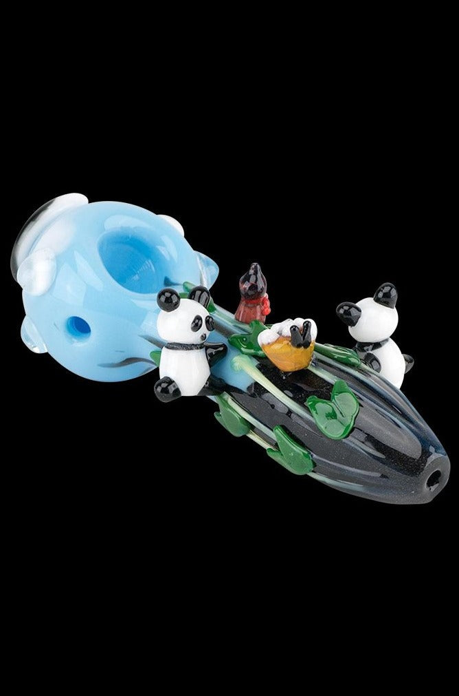 A side view of the Empire Glassworks Spoon Pipe - Climbing Pandas shows sculpted pandas adorning the glass bowl.