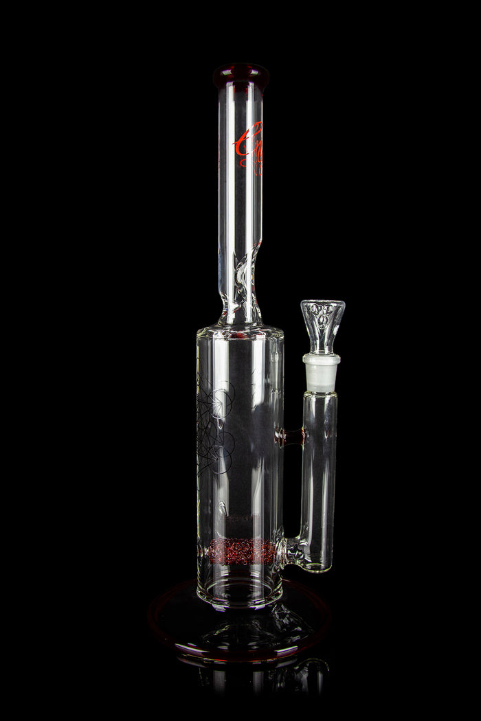 Clear glass water pipe (bong) with intricate etched designs and a translucent joint, isolated on a black background.