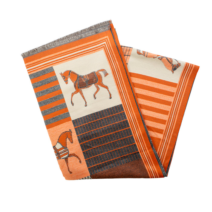 Orange and cream equestrian print scarf with geometric patterns and delicate fringe edges on a white background.
