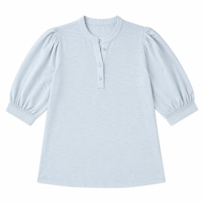 Light blue Erin Gray Kate top in soft Pima cotton with puff sleeves and a buttoned V-neckline on a white background.