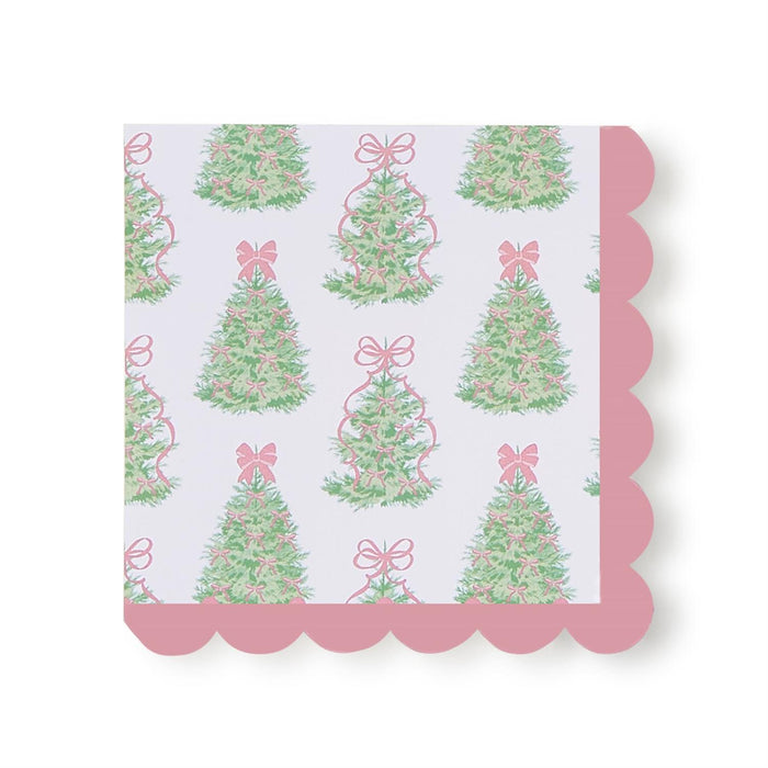 3-ply cocktail napkin with a pink scalloped edge and a festive green Christmas tree and pink bow pattern.