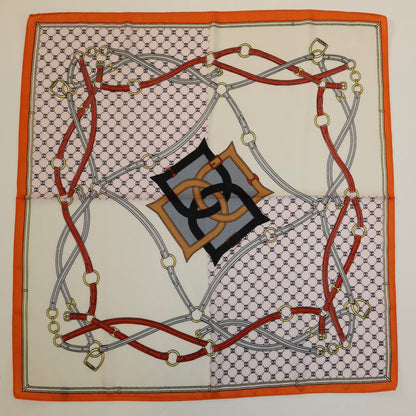 27-inch square polyester twill scarf with a vibrant orange border, equestrian belt print, and geometric logo pattern.