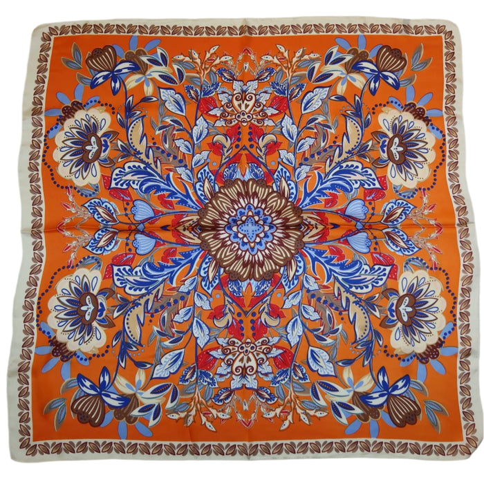 27-inch square polyester scarf featuring a vibrant orange floral pattern with blue and brown botanical accents.