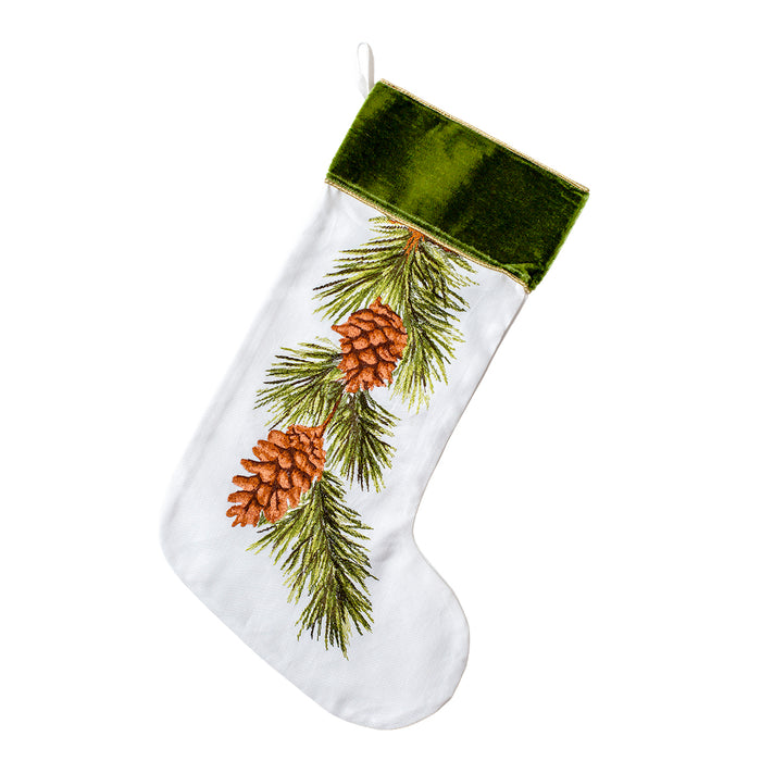 Cream cotton holiday stocking with embroidered pinecones and a forest green velvet cuff.