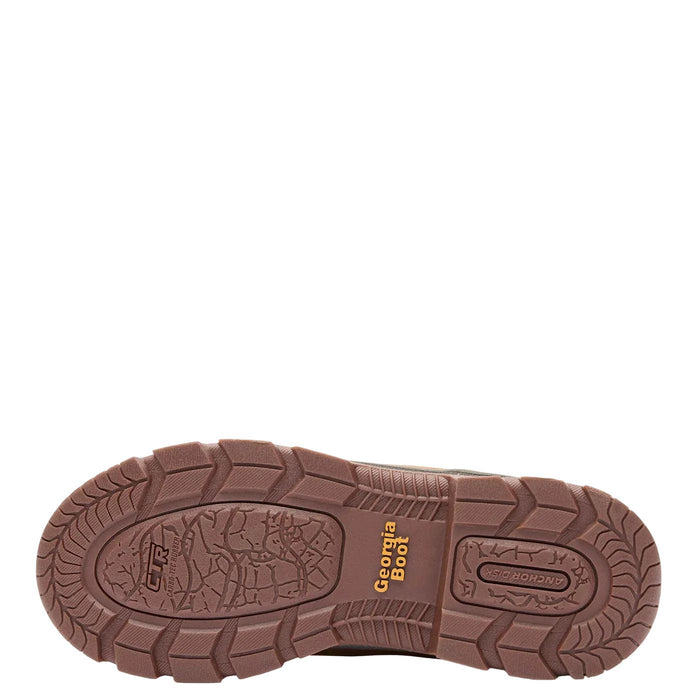 Brown Carbo-Tec rubber outsole of a Georgia Boot kid's shoe with slip-resistant tread and Georgia Boot branding.