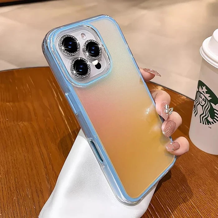 Iridescent phone case with jeweled camera lenses.