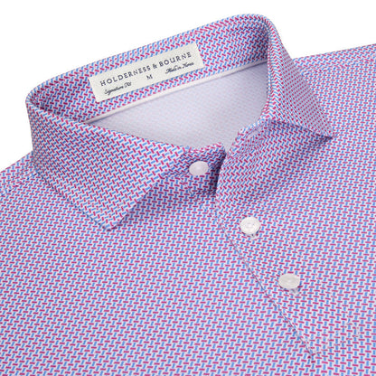 Holderness & Bourne Norman polo in a blue and pink geometric basket weave print with a structured spread collar.