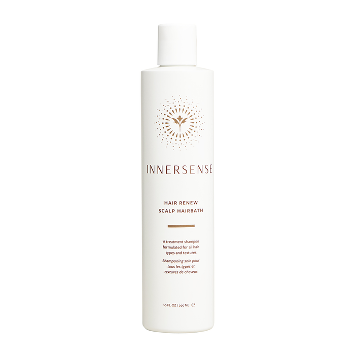A bottle of Innersense Hair Renew Scalp Hairbath shampoo.