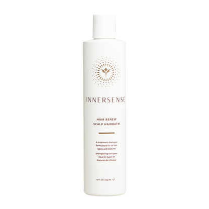 A bottle of Innersense Hair Renew Scalp Hairbath shampoo.