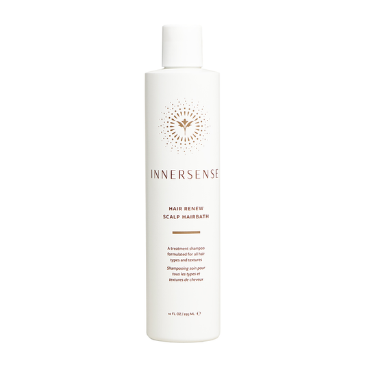 A bottle of Innersense Hair Renew Scalp Hairbath shampoo.