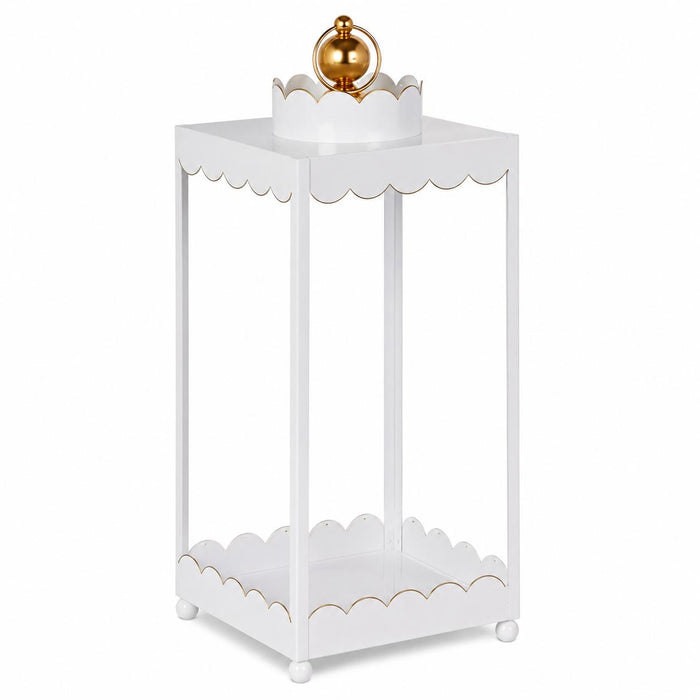 White iron lantern with a scalloped edge design, gold accent top handle, and ball feet for elegant home decor.