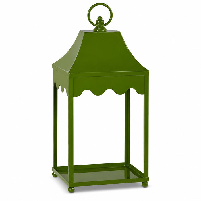 Green iron lantern with a decorative scalloped edge, arched roof, and a circular top handle for hanging.