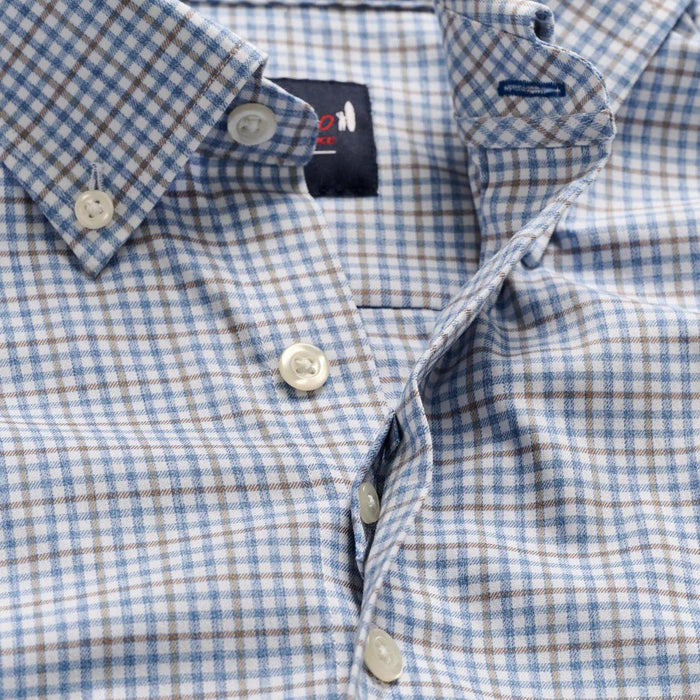 Blue and tan checkered Johnnie-O button-down shirt with a classic collar and white buttons in a performance twill fabric.