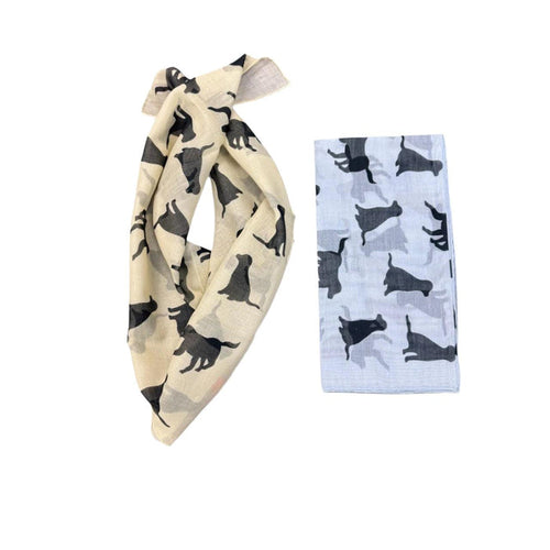 Cream and light blue cotton-cashmere bandanas featuring a repeating black Labrador silhouette pattern.