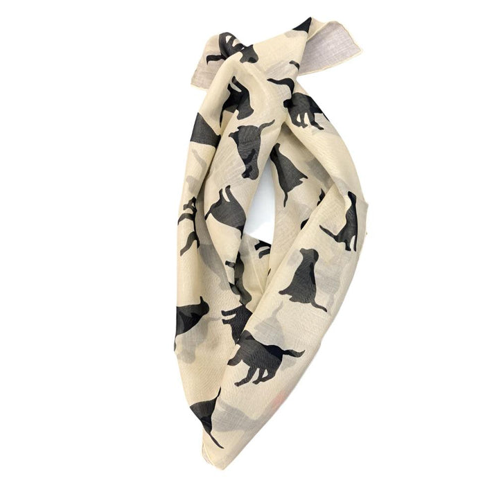 Cream-colored cotton-cashmere bandana featuring a black Labrador silhouette pattern, 25-inch square versatile accessory.