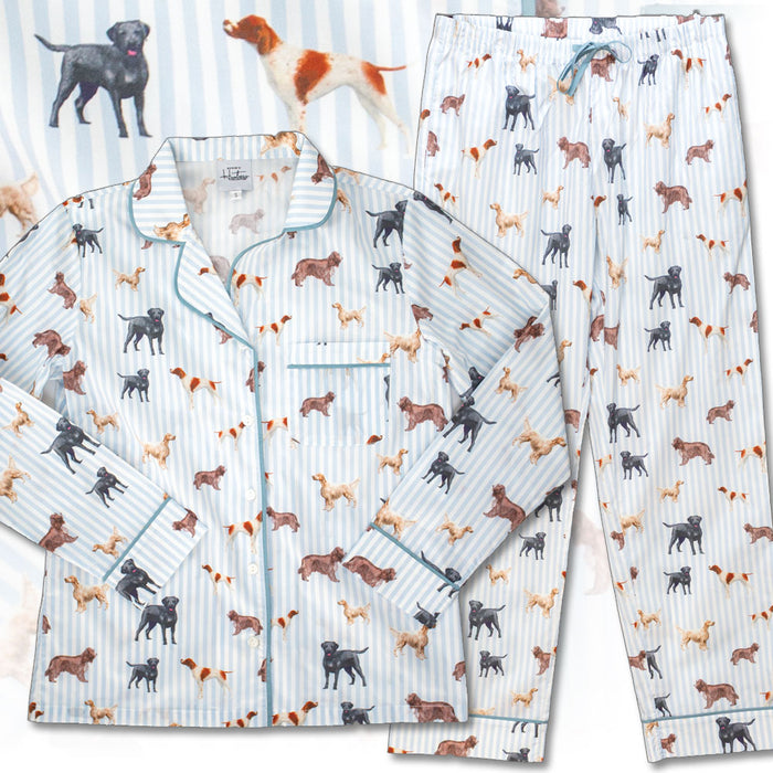 Organic cotton pajama set in pale blue stripes with a whimsical hunting dog print, featuring a button-down top and drawstring pants.