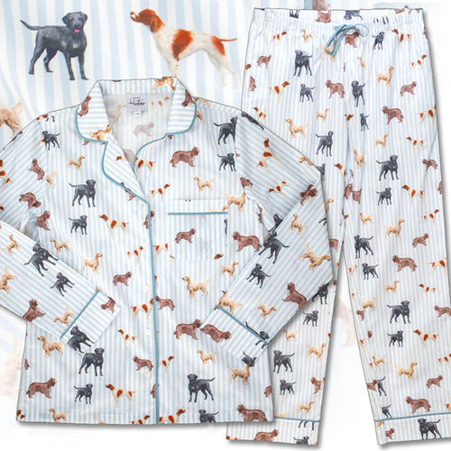 Organic cotton pajama set in pale blue stripes with a whimsical hunting dog print, featuring a button-down top and drawstring pants.