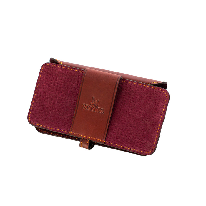 Handcrafted burgundy leather rifle cartridge wallet with a secure flap closure and embossed Kevin's logo.