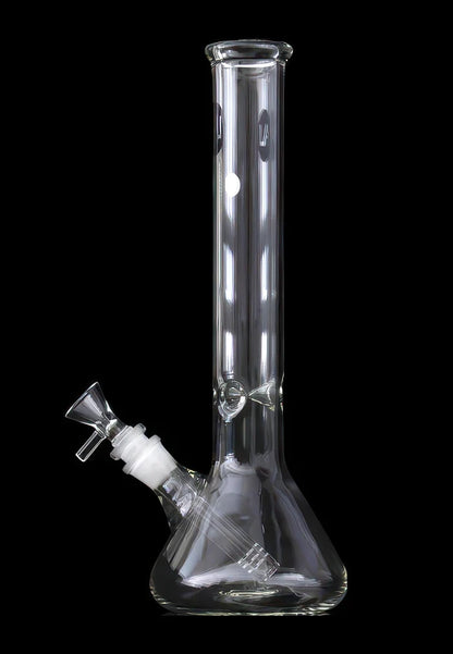 Straight-on view of a clear glass LA Pipes Standard Beaker Bong standing against a black background, showing its tall cylindrical neck, flared mouthpiece and angled downstem.