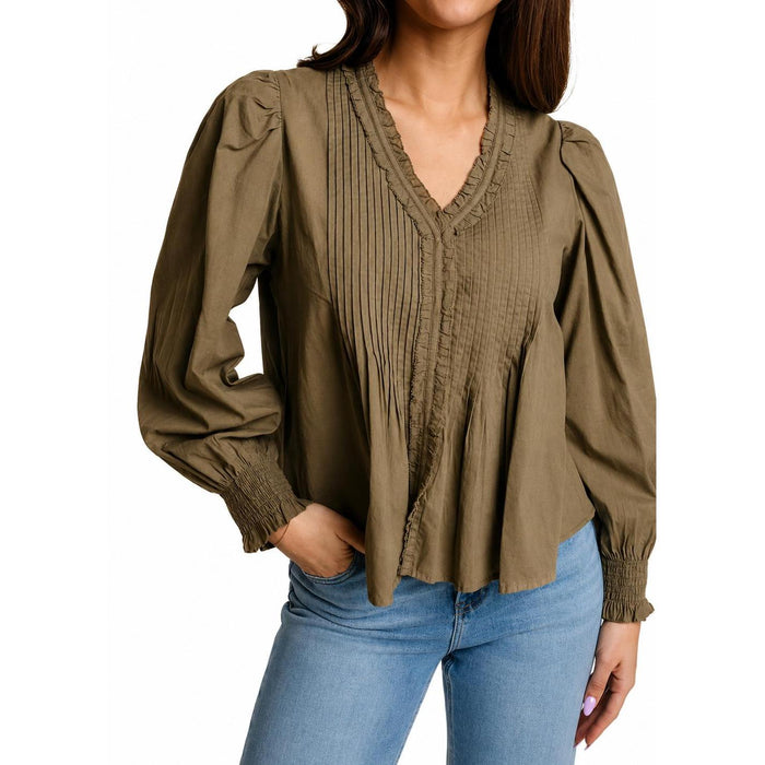 Olive green cotton cambric top featuring ruffled trim, pleated front detailing, and elasticized puff sleeves.