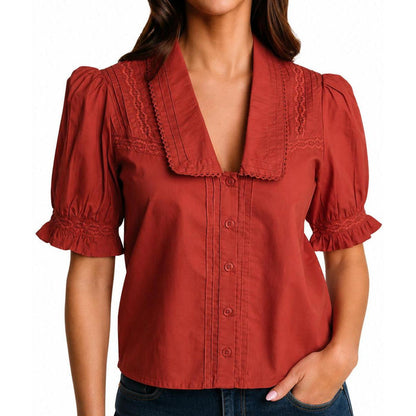 Rust-colored cotton cambric blouse with V-neck, collared neckline, button-down front, and ruffled short sleeves.